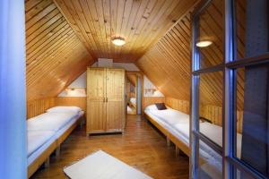 Postel nebo postele na pokoji v ubytování Holiday Village Tatralandia