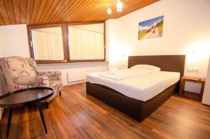 Posteľ alebo postele v izbe v ubytovaní Penthouse EightyOne incl SUMMER CARD by All in One Apartments