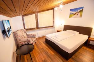 Posteľ alebo postele v izbe v ubytovaní Penthouse EightyOne incl SUMMER CARD by All in One Apartments