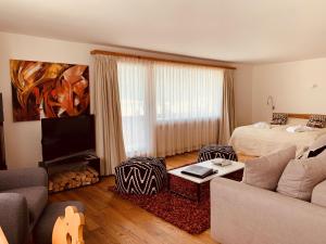 Televizors / izklaižu centrs naktsmītnē Albana Hotel Silvaplana