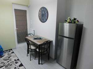 Kuchyň nebo kuchyňský kout v ubytování Niki's apartment