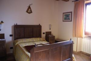 Postelja oz. postelje v sobi nastanitve Agriturismo La Cascina