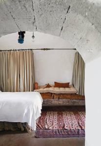 Ліжко або ліжка в номері Il Convento