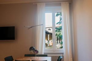 Televízia a/alebo spoločenská miestnosť v ubytovaní Apartments Florence Oblate Exclusive View