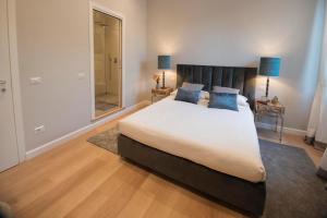 Posteľ alebo postele v izbe v ubytovaní Apartments Florence Oblate Exclusive View