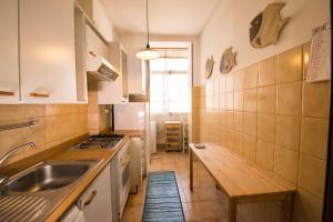 a kitchen with a sink and a counter top at Appartamento 2 in centro a Roma in Rome