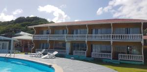 Fotografie z fotogalerie ubytování Kings Landing Hotel v destinaci Union Island + 21 fotografií