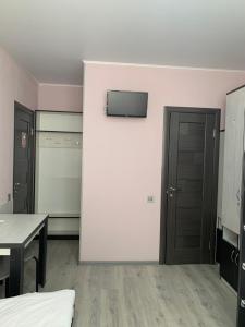 Postel nebo postele na pokoji v ubytování Guest House MAX