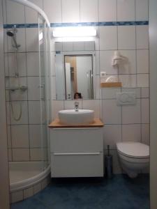 Kopalnica v nastanitvi Seeblick-Appartements Ossiach