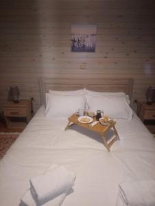 Ein Bett oder Betten in einem Zimmer der Unterkunft House On The Mountain