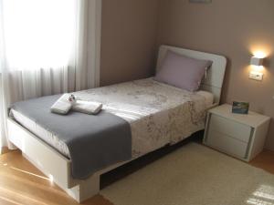 Posteľ alebo postele v izbe v ubytovaní Ane Apartment