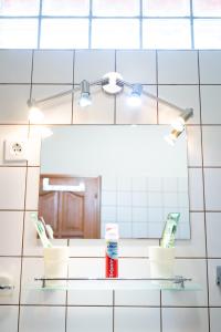 Kúpeľňa v ubytovaní Tip-Top Apartman Ház