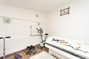Posilňovňa alebo fitness centrum v ubytovaní Tip-Top Apartman Ház
