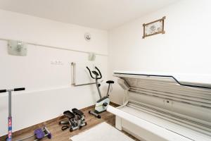 Posilňovňa alebo fitness centrum v ubytovaní Tip-Top Apartman Ház