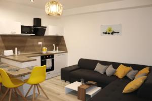 Kuchyňa alebo kuchynka v ubytovaní Apartmán Olaf Tatranská Lomnica