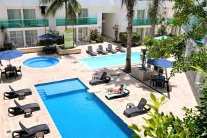 Pemandangan kolam renang di Hotel Los Cocos Chetumal atau berdekatan