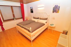 Postel nebo postele na pokoji v ubytování Haus Rheinterrasse