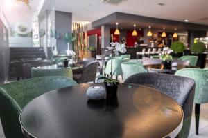 Uma área de estar em RR Hotel da Rocha