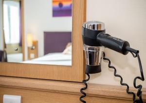 Postel nebo postele na pokoji v ubytování Stables Inn, Aintree