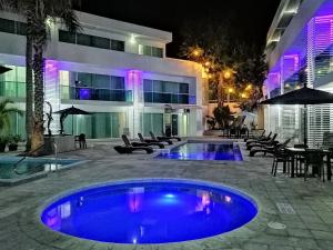 Bazén v ubytování Hotel Los Cocos Chetumal nebo v jeho okolí