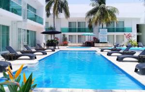 Bazén v ubytování Hotel Los Cocos Chetumal nebo v jeho okolí