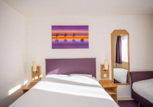 Postel nebo postele na pokoji v ubytování Stables Inn, Aintree