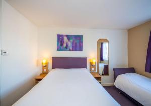 Postel nebo postele na pokoji v ubytování Stables Inn, Aintree