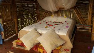 a room with a bed in a small room at El Cielo Biohospedaje - Reserva Natural Sostenible in Tena +72 photos