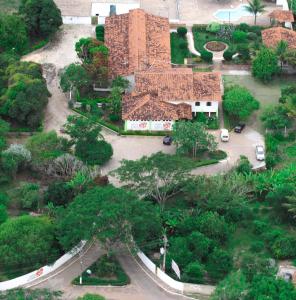 an aerial view of a park with a brick building at Pousada Ecológica das Bromélias in Morro do Chapéu