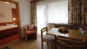 Postel nebo postele na pokoji v ubytování Haus Enzian