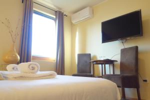 Postel nebo postele na pokoji v ubytování Villa Quantum Beograd