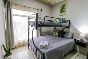 Ένα ή περισσότερα κρεβάτια σε δωμάτιο στο Apartamento Lantana