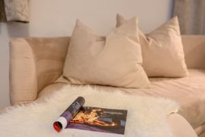 A bed or beds in a room at Das Landhaus