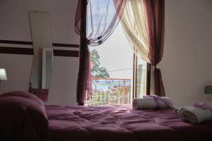 Postelja oz. postelje v sobi nastanitve B&B Magma