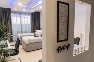Posteľ alebo postele v izbe v ubytovaní Alpha apartment