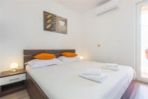 Posteľ alebo postele v izbe v ubytovaní Villa top of Murter, one bedroom apartment + 21 fotografií