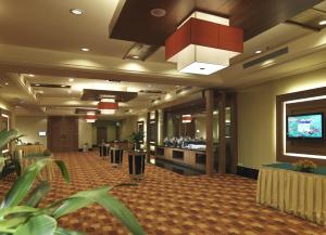 a lobby of a restaurant with a bar at Cititel Mid Valley in Kuala Lumpur