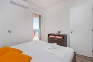 Posteľ alebo postele v izbe v ubytovaní Villa top of Murter, one bedroom apartment 2