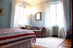 A bed or beds in a room at Art Apartment Villa Mannelli
