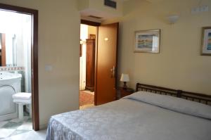 Posteľ alebo postele v izbe v ubytovaní Hotel Locanda Salieri