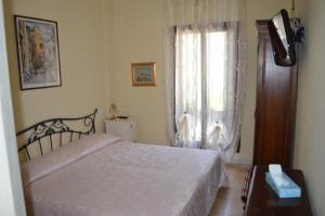 Posteľ alebo postele v izbe v ubytovaní Hotel Locanda Salieri