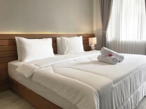 Letto o letti in una camera di Mantra Gili