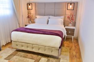 Postel nebo postele na pokoji v ubytování Casa Lua Hotel Spa