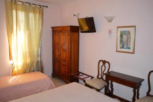 Posteľ alebo postele v izbe v ubytovaní Hotel Locanda Salieri