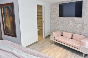 TV a/nebo společenská místnost v ubytování Casa Lua Hotel Spa