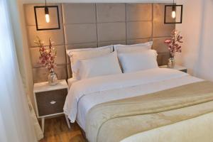 Postel nebo postele na pokoji v ubytování Casa Lua Hotel Spa