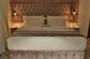 Postel nebo postele na pokoji v ubytování Casa Lua Hotel Spa