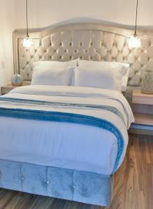 Postel nebo postele na pokoji v ubytování Casa Lua Hotel Spa