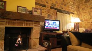 Photo de la galerie de l'établissement La Casa de Piedra de la Aldea, à Aldea del Pinar