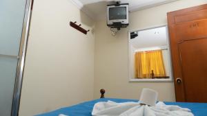 Postel nebo postele na pokoji v ubytování Hospedaje Wicirare + 28 fotografií